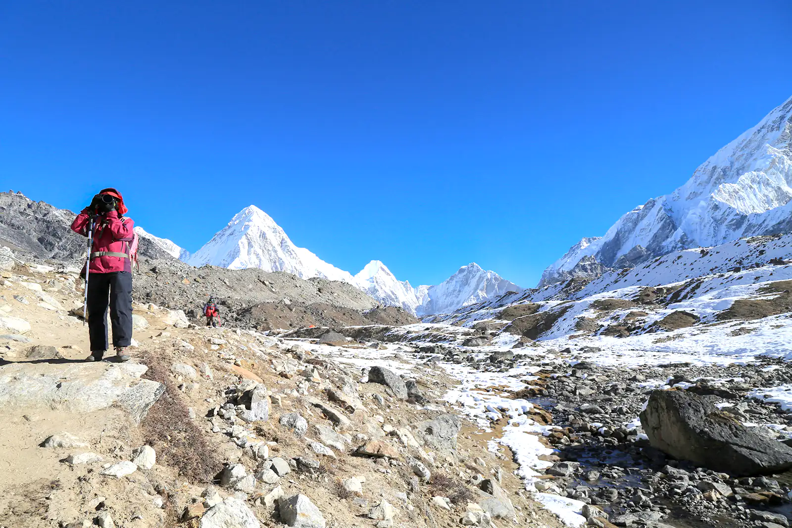 trekker kala patthar and pumo ri summit from everest trek nepal
