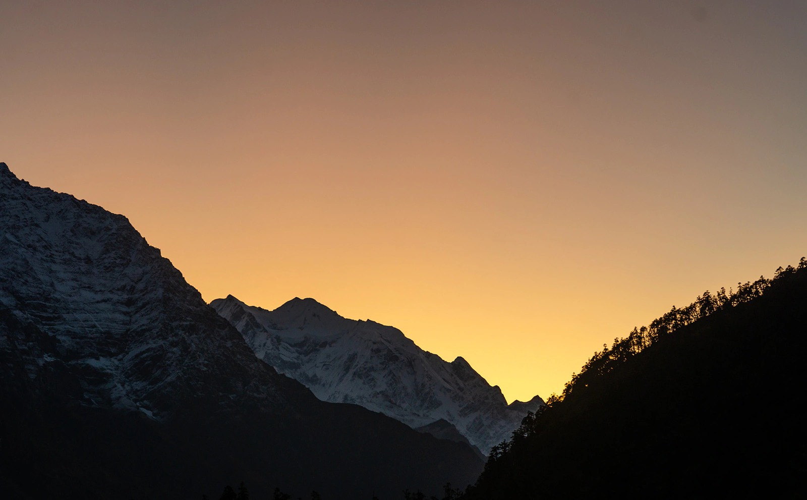 The soothing orange light in the dawn. View from Shyala, Gorkha in Manaslu Circuit