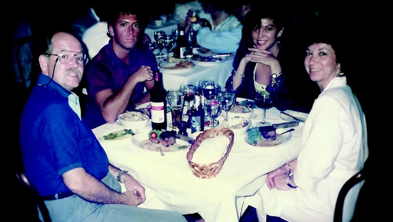 Chris, Walt, Billie, and Carine at dinner after his graduation from Emory University in May 1990. (Carine McCandless Family Collection)
