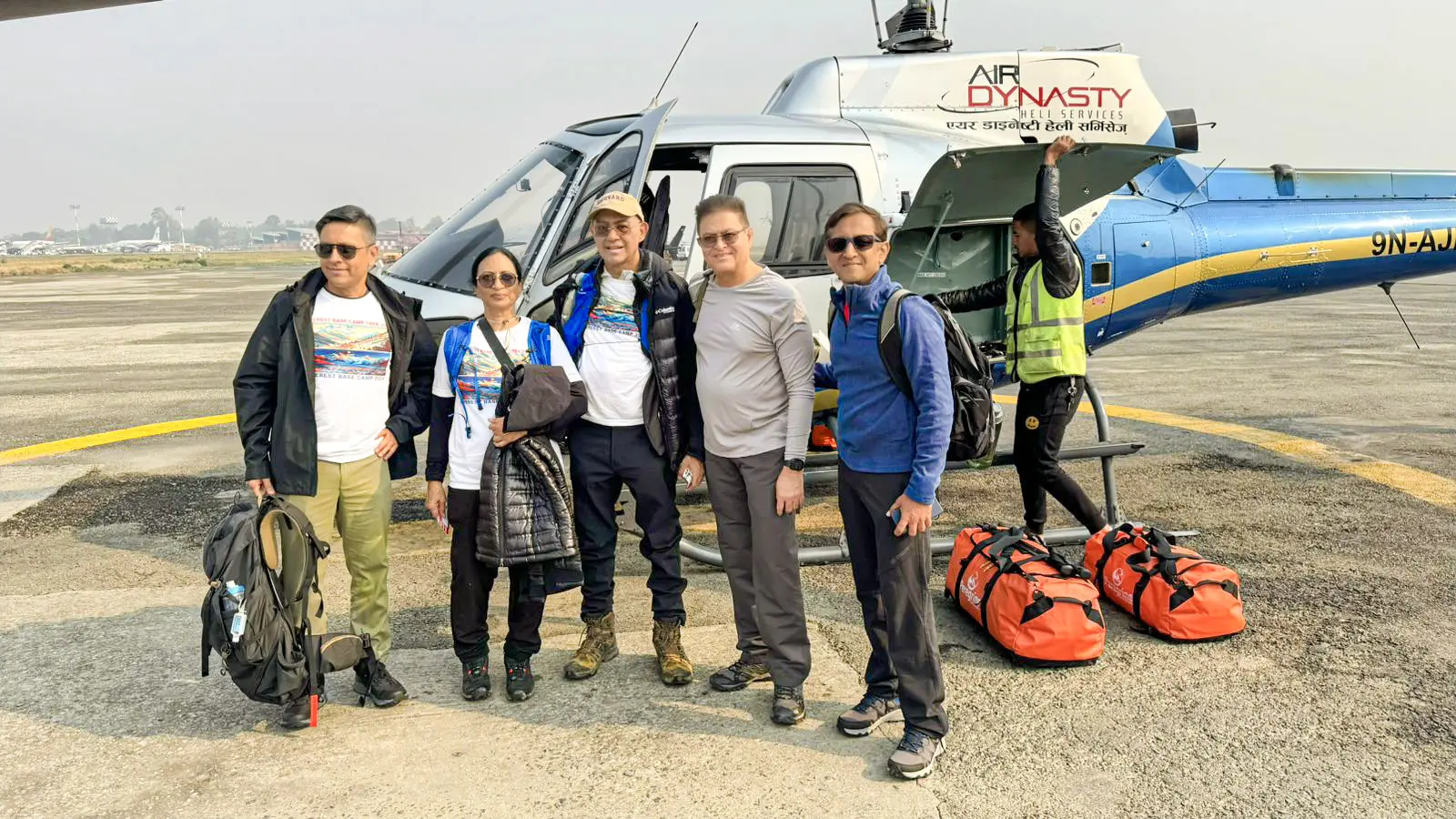 Peregrine clients boarding helicopter at Kathmandu for the private flight to Lukla on the luxury Everest Base Camp trek