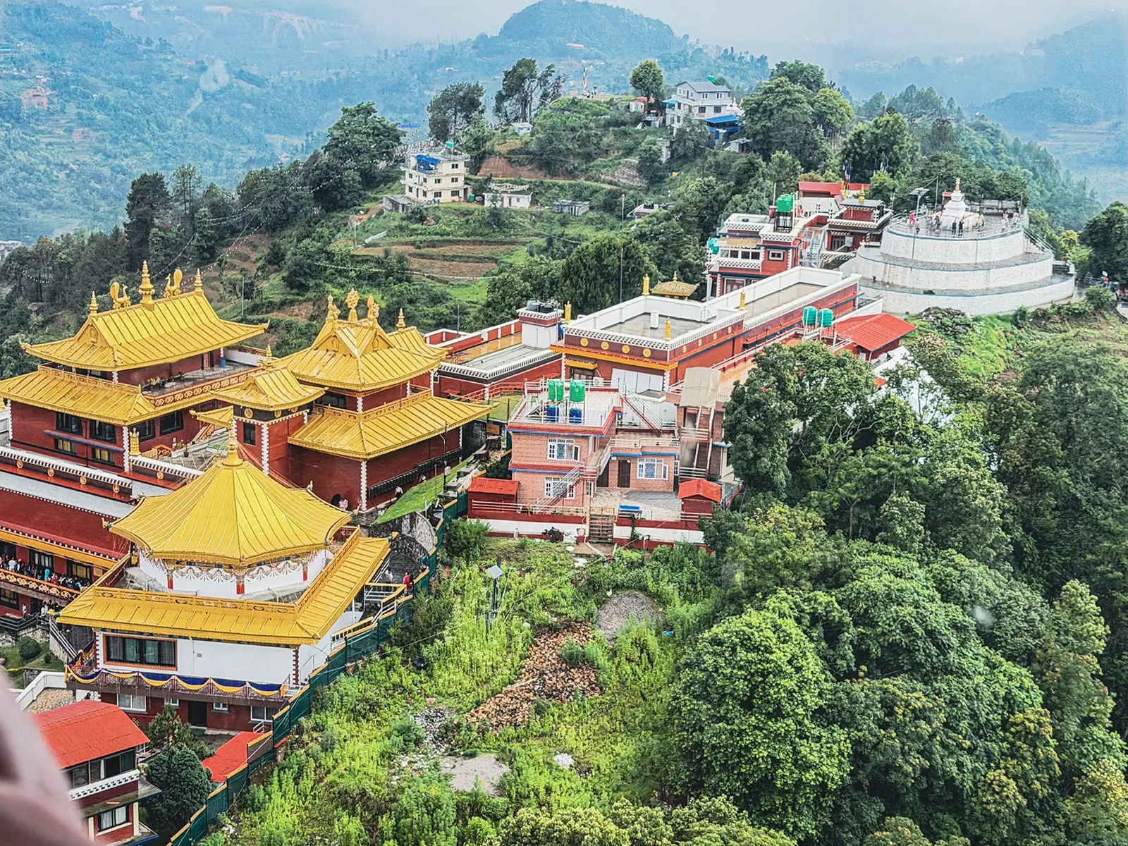Aerial view of Namobuddha monastery from the helicopter return flight to Kathmandu on the luxury Everest Base Camp trek