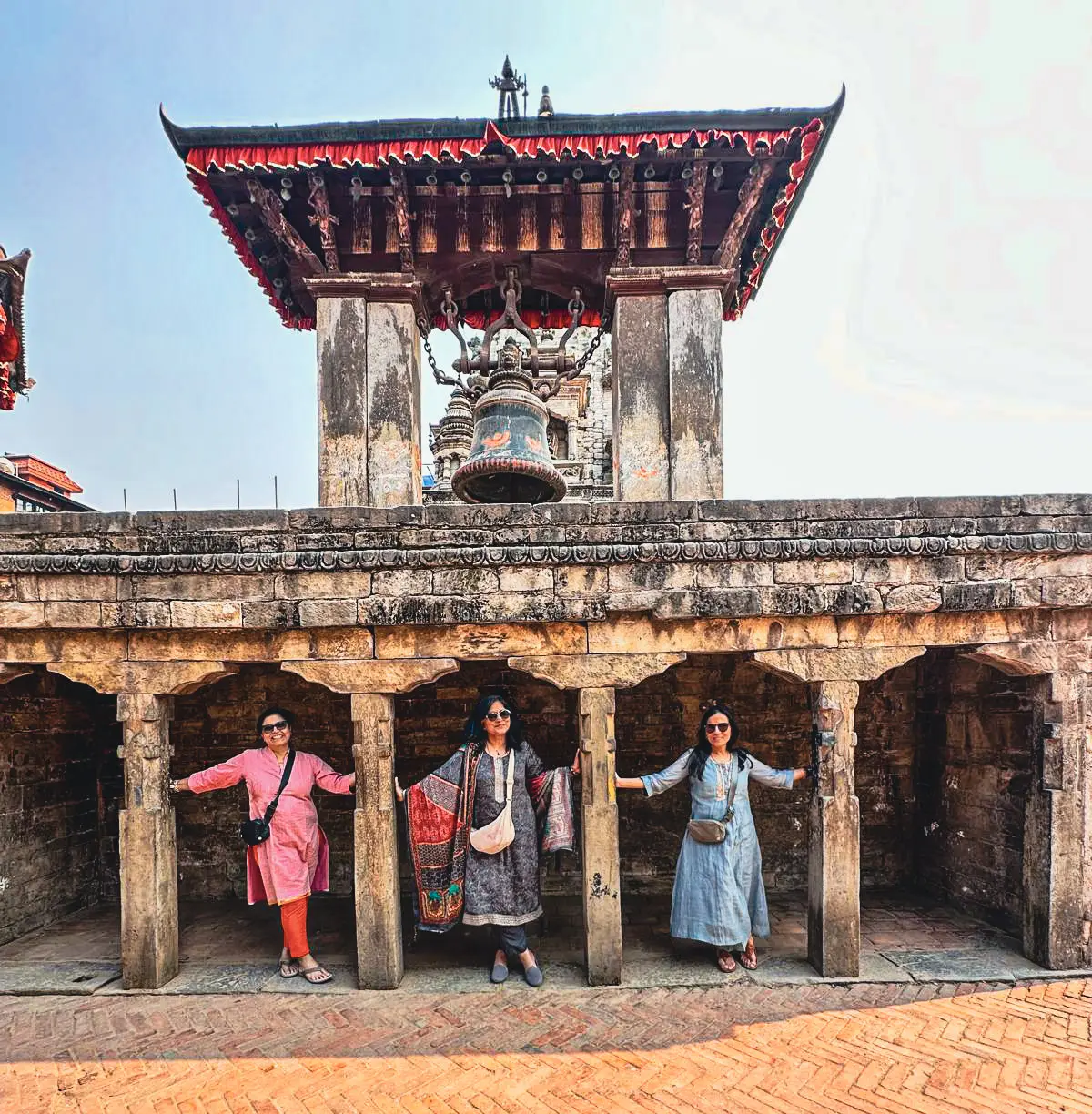 Peregrine clients exploring a Newari temple during the guided Kathmandu Valley sightseeing tour