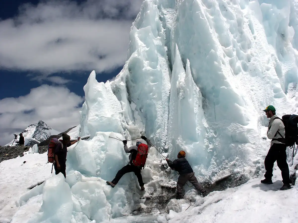 Crossing a tricky ice section close to Advanced Base Camp