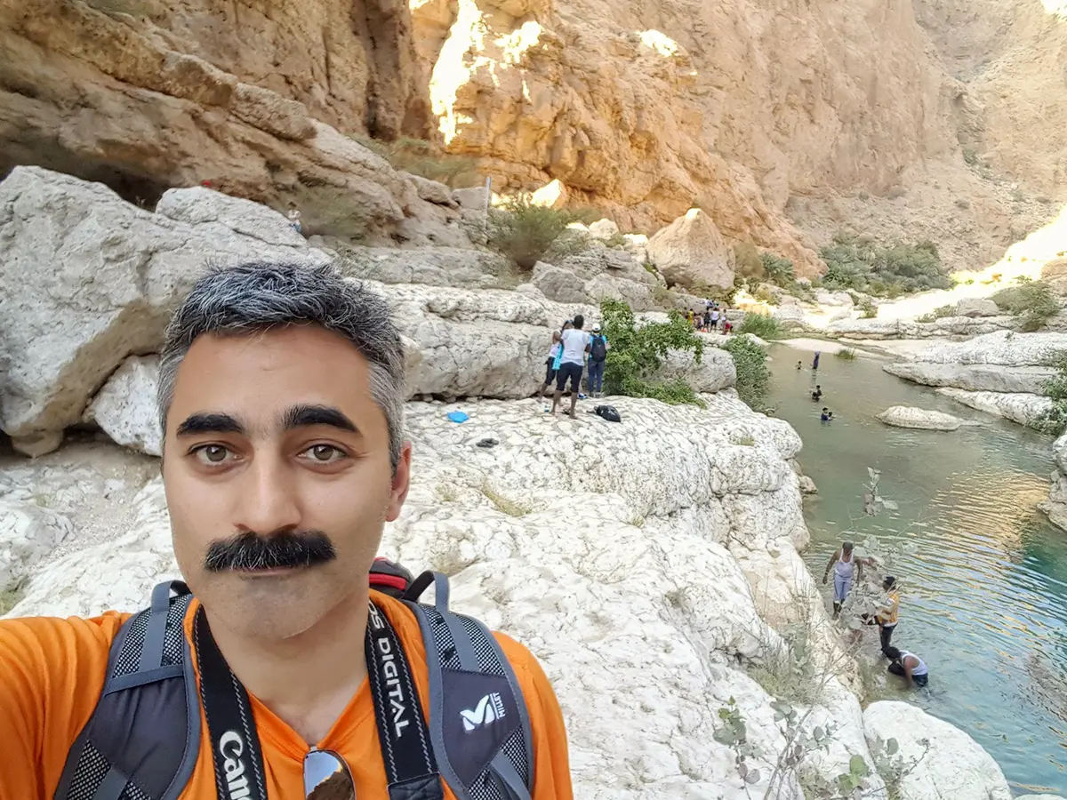 A dream hike in waterfall cave in Wadi Shaab in Oman