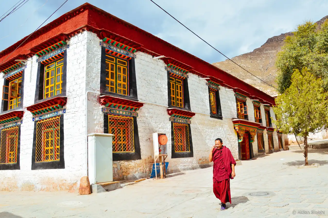 A Tibetan monk gestures emphatically during a debate at Sera Monastery in Lhasa, Tibet.