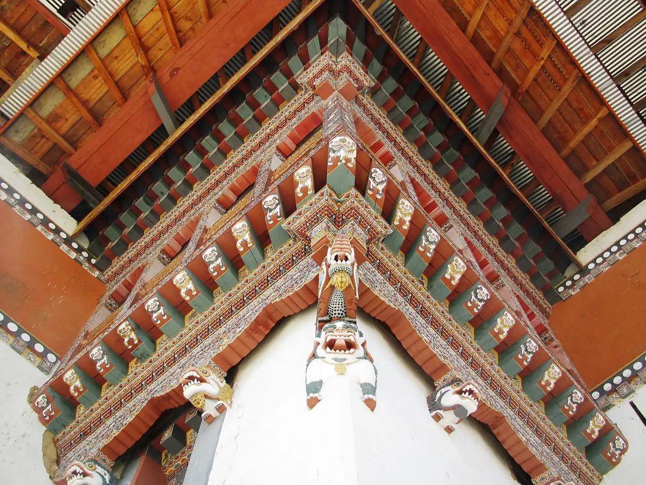 Close-up of decorative woodwork and carvings on Simtokha Dzong in Bhutan