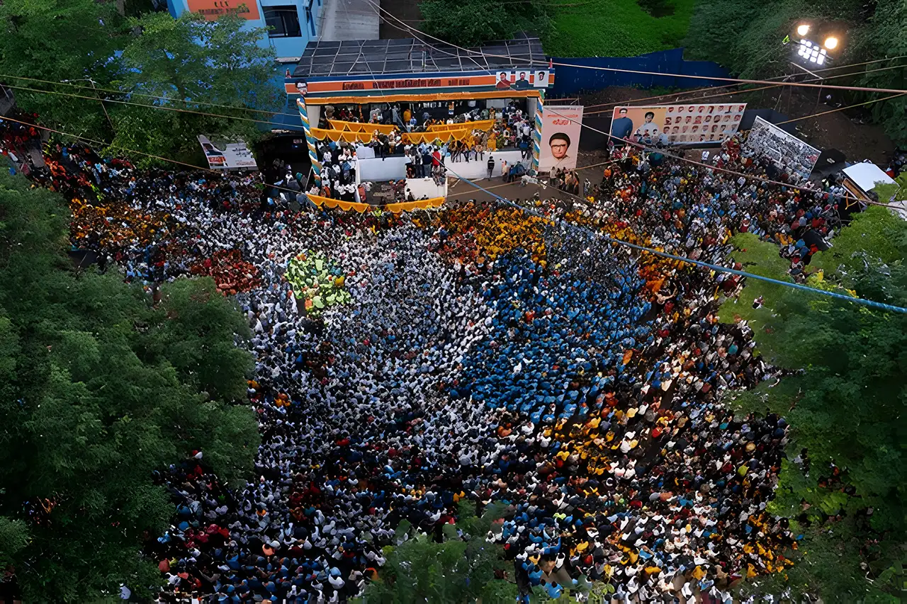 Aerial view of a large crowd gathered for Dahi Handi event during Janmashtami in Thane, Maharashtra, India.
