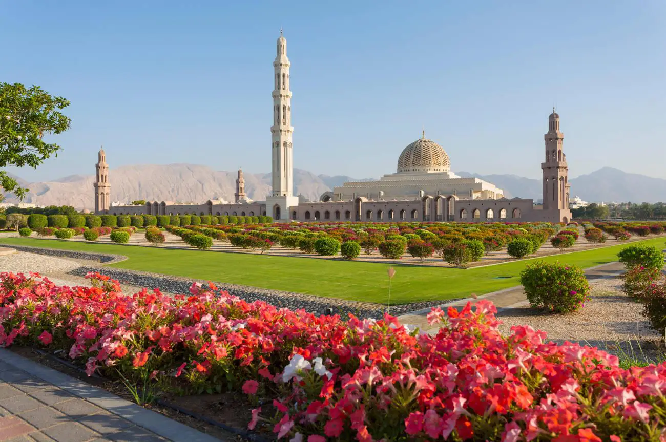 Sultan Qaboos Grand Mosque with gardens in the foreground, Muscat, Oman