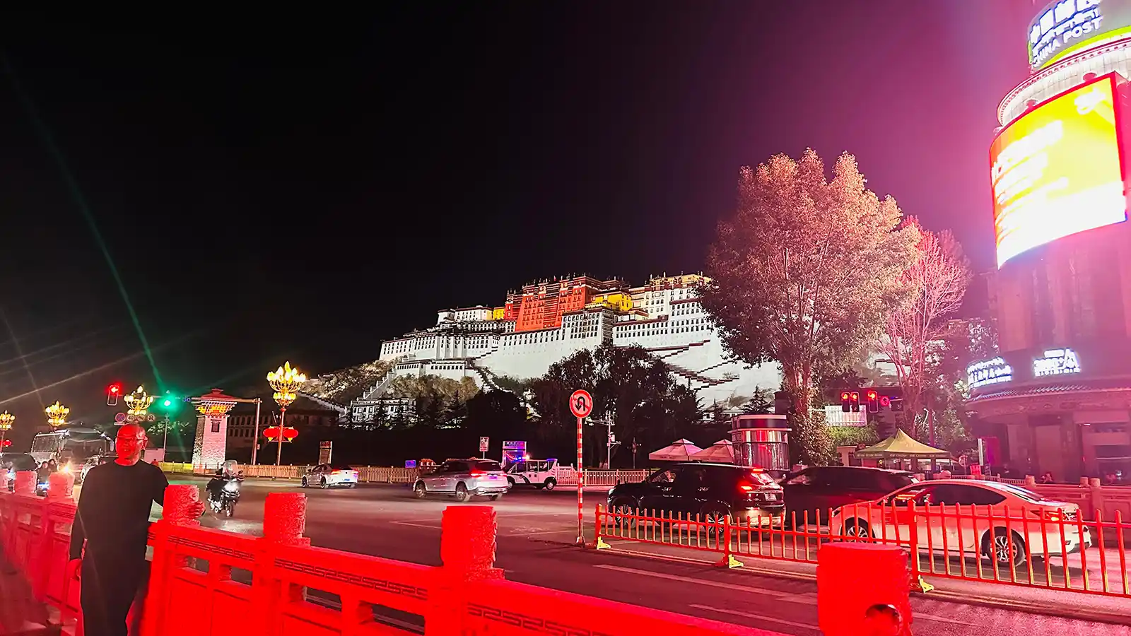Night view of the Potala Palace illuminated with street lights in Lhasa, Tibet.
