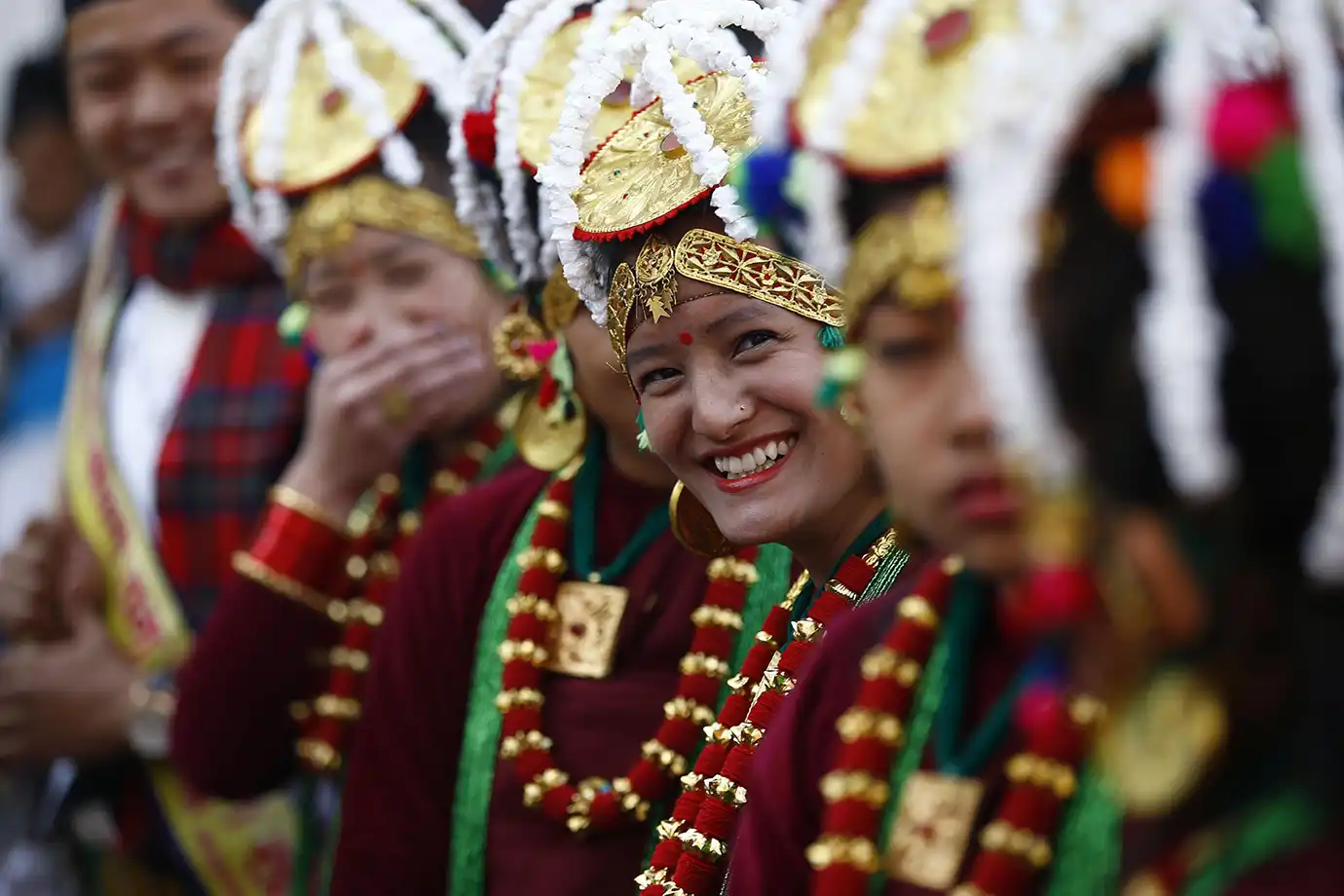 Women celebrating Tamu Losar festival in Nepal wearing traditional Gurung dress and gold jewelry
