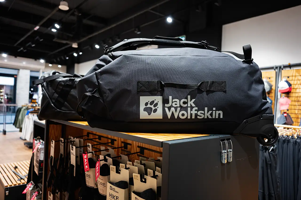 Large trekking duffel bag displayed in an outdoor gear shop, commonly used to pack equipment for Everest Base Camp treks and high-altitude Himalayan expeditions.