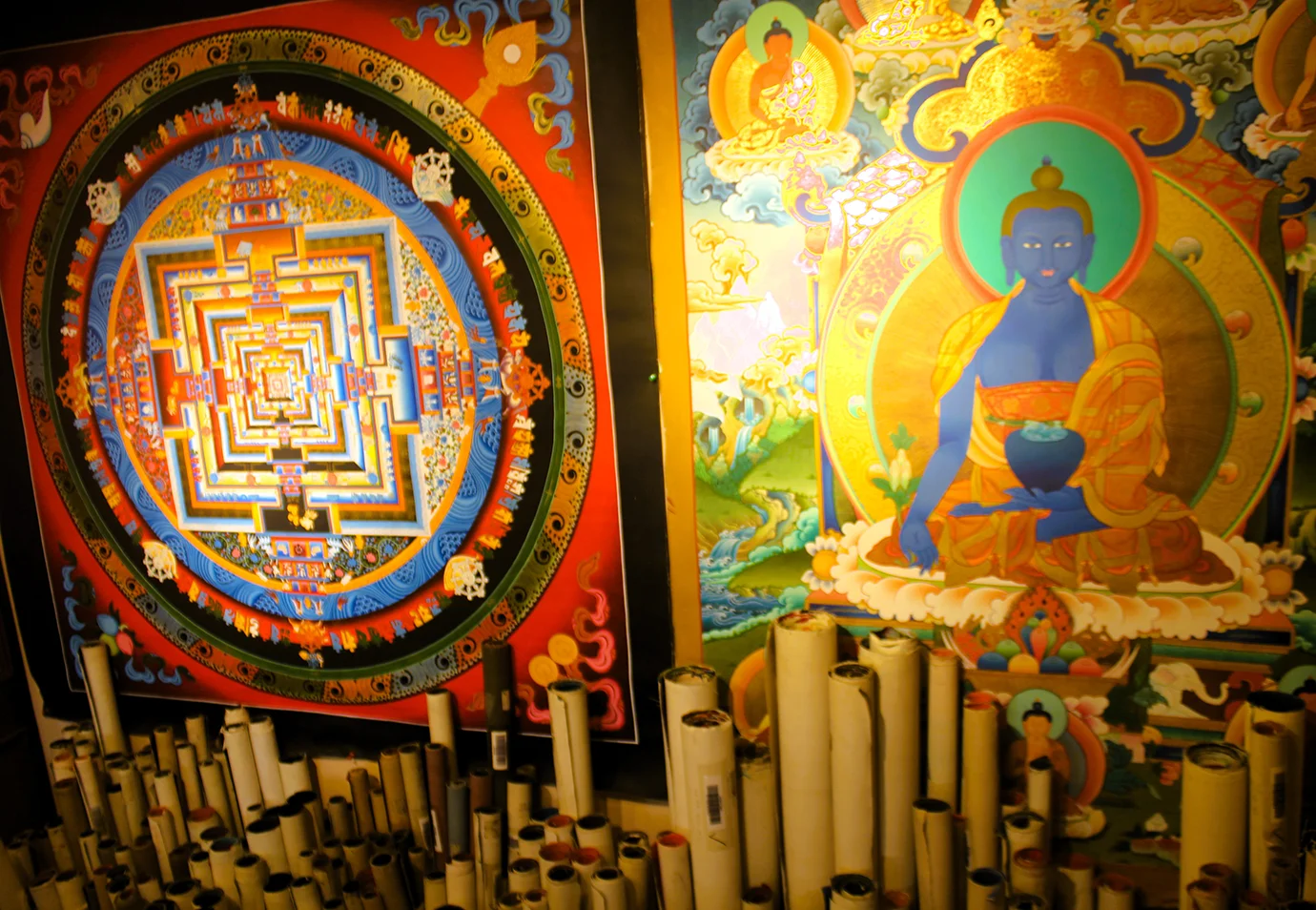 Traditional thangka paintings in Nepal during the Best Time for a Luxury Nepal Tour, showcasing intricate Buddhist artwork and vibrant sacred cultural heritage.