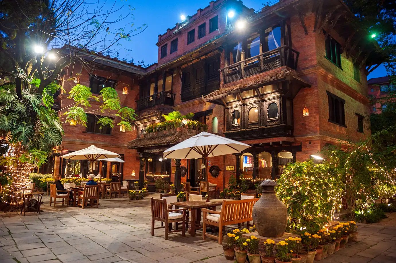 The heritage architecture and romantic courtyard of a boutique hotel.