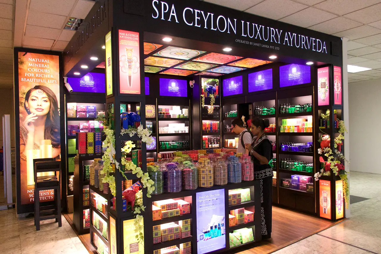 Ayurveda in Sri Lanka is featured at a Spa Ceylon Luxury Ayurveda retail store display inside an airport terminal.