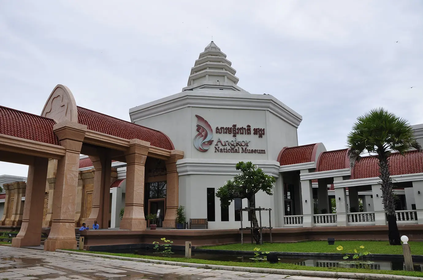 The modern Khmer-style exterior of the Angkor National Museum with manicured gardens featured in a guide on Things to Do in Siem Reap Beyond Angkor Wat.