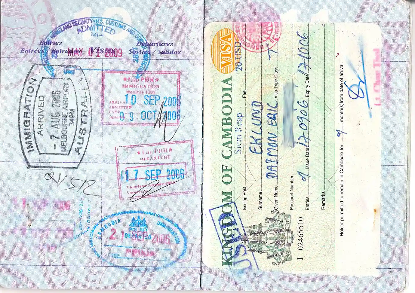 A full page of a passport displaying an official Cambodian Visa T sticker along with entry and exit immigration stamps featured in a travel guide on Cambodia Visa Requirements.